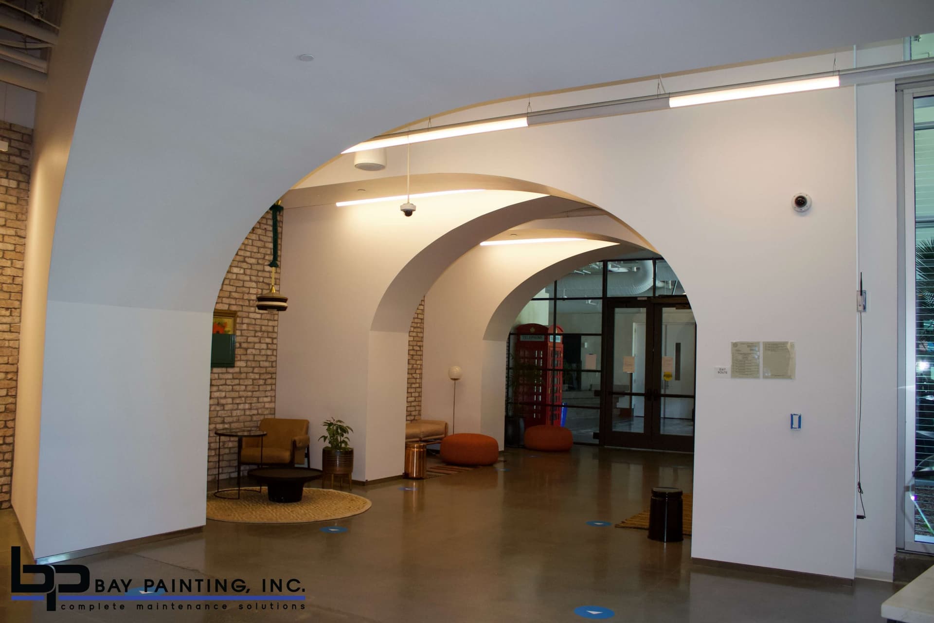 Freshly painted arched hallway in a commercial office lobby in San Jose, CA